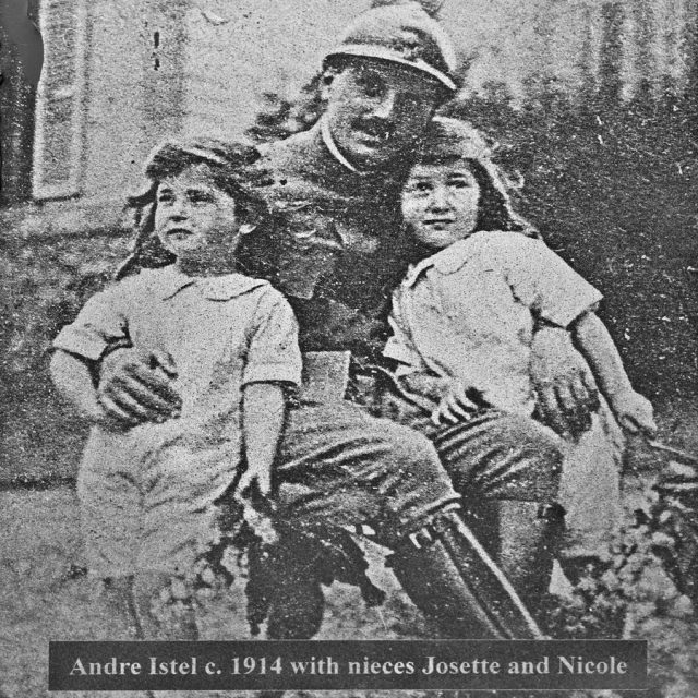 Engraving on a marble panel for the Maze of Honor of a photograph from 1914 where a seated man in military uniform hugs a small female child on each side of him