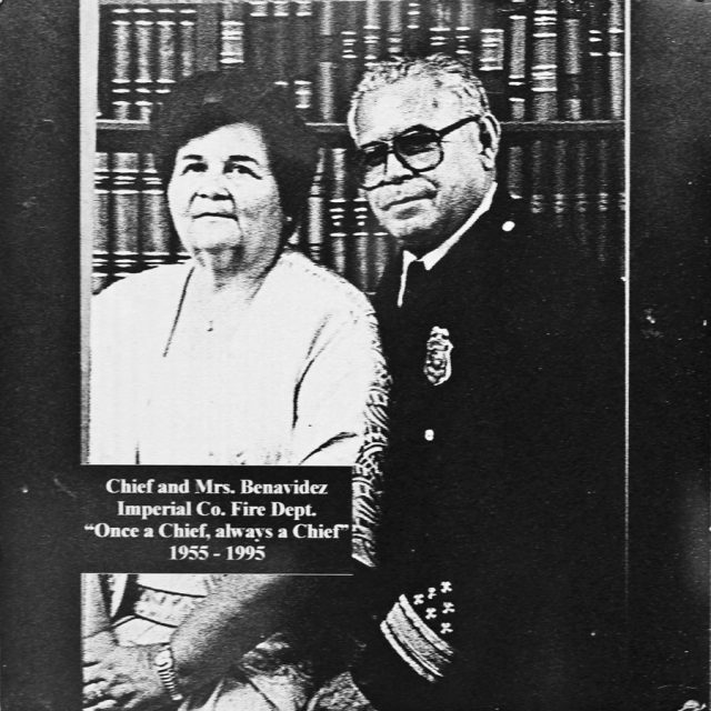 Older man wearing thick rimmed glasses and older woman with short bobbed hair engraved on marble panel for Maze of Honor