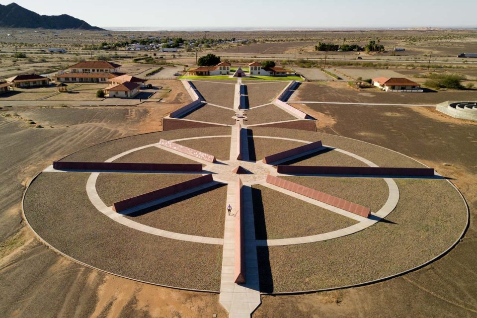 Aerial of the History of Humanity in Granite Red Missouri Granite monuments, the pyramid at the Center of the World, the United States Postal Office of Felicity, California, and the museum shop